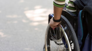 A man riding in a wheelchair